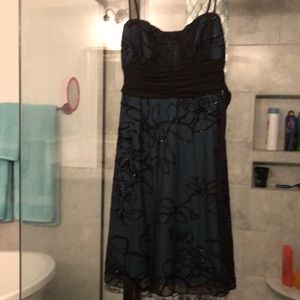 Turquoise dress with black glitter flower overlay